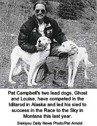 Pat Cambell and his two lead dogs, Ghost and Louise